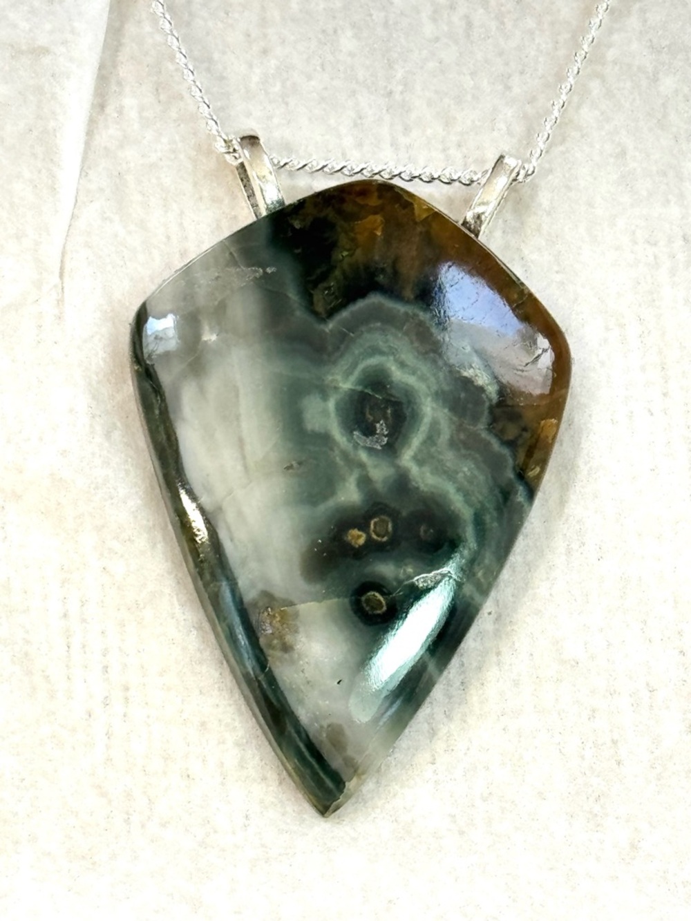 Rare Mushroom Rhyolite pendant on 20” SS CHAIN.